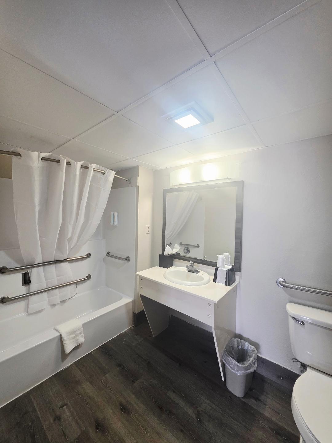 Guest bathroom with tub and shower at Briarstone Inn